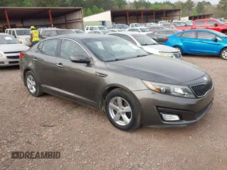2015 Kia Optima LX with VIN 5XXGM4A74FG401418, listed as a IAAI auction lot 41899008 with 125,812 mi miles. Bid and sale history available at carsss.com. Image 1.