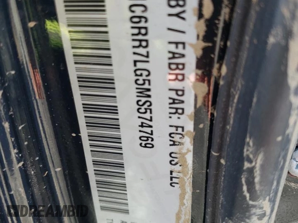 2021 Ram 1500 SLT z VIN 1C6RR7LG5MS574769, wystawiony jako Copart lot #75797744 z przebiegiem Nie podano mil oraz Nie do naprawy • Non repairable. Historia ofert i sprzedaży dostępna na DreamBid. Obrazek 13.