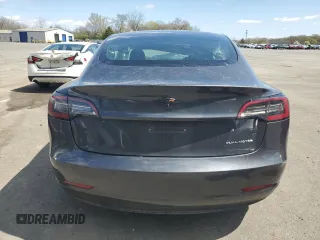 2018 Tesla Model 3 Long Range Battery with VIN 5YJ3E1EB6JF066148, listed as a Copart auction lot 52304285 with Not Provided miles and Salvage Title. Bid and sale history available at DreamBid. Image 6.