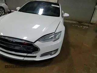 2015 Tesla Model S 85D with VIN 5YJSA1H24FF092628, listed as a Copart auction lot 51959035 with 128,744 mi miles and Salvage Title. Bid and sale history available at carsss.com. Image 13.