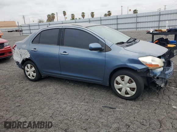 2010 Toyota Yaris with VIN JTDBT4K39A1393586, listed as a Copart auction lot 52240095 with 180,235 mi miles and Clean Title. Bid and sale history available at DreamBid. Image 4.