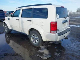 2008 Dodge Nitro SLT with VIN 1D8GT58K68W288772, listed as a IAAI auction lot 41621789 with 187,410 mi miles. Bid and sale history available at carsss.com. Image 3.