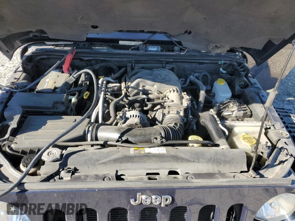 2013 Jeep Wrangler Unlimited Rubicon 10th Anniversary с VIN 1C4HJWFG7DL559539, выставлен на аукционе Copart как лот 81675894 с пробегом 99 425 миль миль и Списание • Salvage title. История ставок и продаж доступна на DreamBid. Изображение 11.