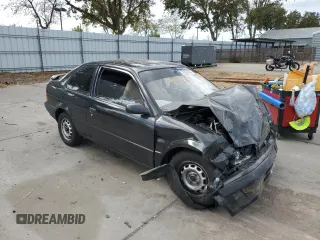 1996 Toyota Tercel DX z VIN JT2AC52LXT0157984, wystawiony jako Copart lot #76524974 z przebiegiem Nie podano mil oraz Szkody całkowita. Historia ofert i sprzedaży dostępna na DreamBid. Obrazek 4.