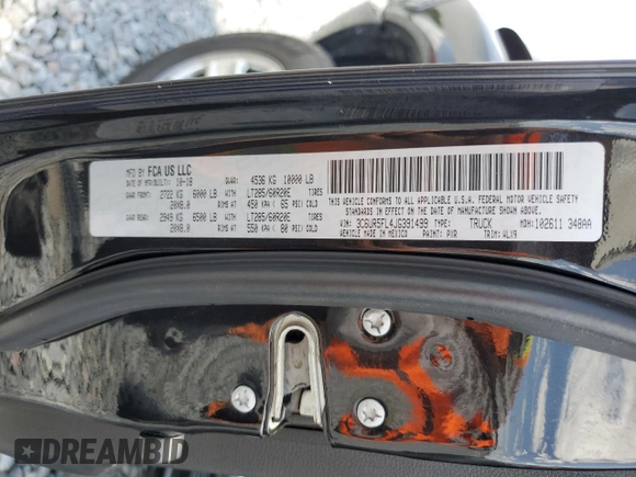 2018 Ram 2500 Laramie with VIN 3C6UR5FL4JG391499, listed as a Copart auction lot 52819635 with 93,230 mi miles and Salvage title. Bid and sale history available at DreamBid. Image 12.