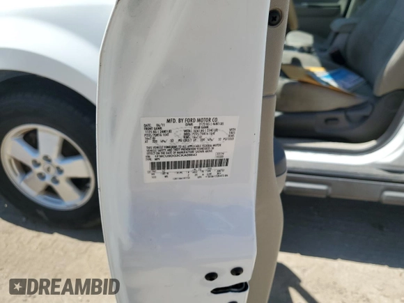 2012 Ford Escape XLT z VIN 1FMCU9DG3CKA09843, wystawiony jako Copart lot #63585395 z przebiegiem Nie podano mil oraz Szkoda całkowita • Salvage title. Historia ofert i sprzedaży dostępna na DreamBid. Obrazek 12.