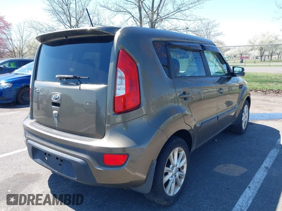 2012 Kia Soul + with VIN KNDJT2A68C7458729, listed as a IAAI auction lot 42002817 with 249,600 mi miles. Bid and sale history available at carsss.com. Image 4.