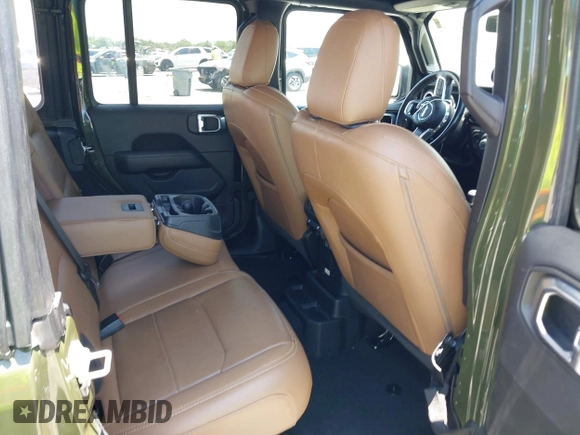 2022 Jeep Wrangler Unlimited Sahara z VIN 1C4HJXEN3NW242458, wystawiony jako IAAI lot #42352073 z przebiegiem 26 154 mil mil oraz . Historia ofert i sprzedaży dostępna na DreamBid. Obrazek 8.