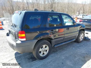 2007 Ford Escape XLT with VIN 1FMCU03147KB80499, listed as a IAAI auction lot 41897541 with 190,743 mi miles. Bid and sale history available at carsss.com. Image 4.