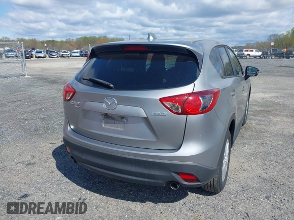 2013 Mazda CX-5 Touring with VIN JM3KE4CE5D0125470, listed as a IAAI auction lot 42051475 with 277,077 mi miles. Bid and sale history available at carsss.com. Image 16.