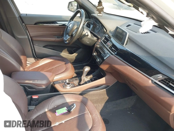 2017 BMW X1 xDrive28i with VIN WBXHT3C39H5F84338, listed as a IAAI auction lot 42400168 with 48,673 mi miles and . Bid and sale history available at DreamBid. Image 5.