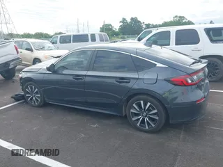 2024 Honda Civic EX-L z VIN 19XFL1H71RE009481, wystawiony jako IAAI lot #42308375 z przebiegiem 14 172 mil mil oraz . Historia ofert i sprzedaży dostępna na DreamBid. Obrazek 14.