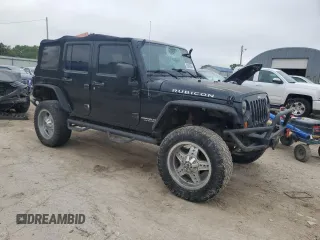 2007 Jeep Wrangler Unlimited Rubicon with VIN 1J4GA69117L112867, listed as a Copart auction lot 59909565 with 166,963 mi miles and Salvage title. Bid and sale history available at DreamBid. Image 4.