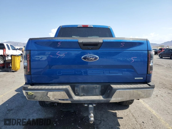2018 Ford F-150 XL with VIN 1FTEW1EGXJKD26409, listed as a Copart auction lot 59403645 with 122,373 mi miles and Salvage title. Bid and sale history available at DreamBid. Image 6.
