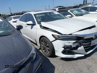 2021 Honda Accord EX-L with VIN 1HGCV1F57MA074704, listed as a IAAI auction lot 42332773 with 54,630 mi miles and . Bid and sale history available at DreamBid. Image 1.