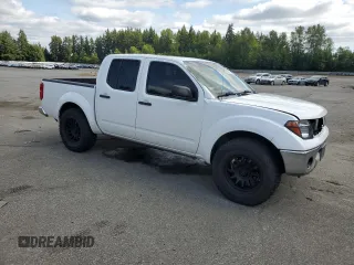 2006 Nissan Frontier SE with VIN 1N6AD07U36C427811, listed as a Copart auction lot 57865725 with 151,598 mi miles and Salvage title. Bid and sale history available at DreamBid. Image 4.