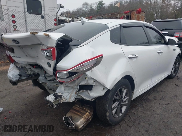 2020 Kia Optima LX with VIN 5XXGT4L37LG386597, listed as a IAAI auction lot 41934068 with 133,820 mi miles and . Bid and sale history available at DreamBid. Image 4.