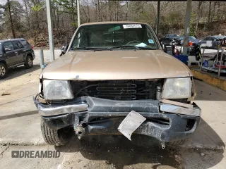 1999 Toyota Tacoma with VIN 4TAWN72NXXZ563507, listed as a Copart auction lot 49888575 with 387,818 mi miles and Salvage title. Bid and sale history available at DreamBid. Image 5.