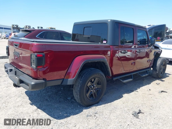 2021 Jeep Gladiator Freedom with VIN 1C6HJTAG2ML549434, listed as a IAAI auction lot 42059434 with 29,041 mi miles and . Bid and sale history available at DreamBid. Image 4.