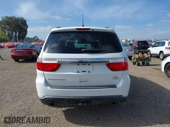 2013 Dodge Durango Crew with VIN 1C4SDHDT2DC679600, listed as a IAAI auction lot 42215737 with 128,499 mi miles and . Bid and sale history available at DreamBid. Image 16.
