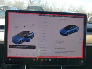 2018 Tesla Model 3 Long Range Battery z VIN 5YJ3E1EB3JF117007, wystawiony jako IAAI lot #41753572 z przebiegiem 82 444 mil mil oraz . Historia ofert i sprzedaży dostępna na DreamBid. Obrazek 7.