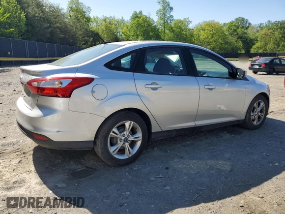 2013 Ford Focus SE with VIN 1FADP3F27DL207986, listed as a Copart auction lot 54608055 with 128,081 mi miles and Salvage title. Bid and sale history available at DreamBid. Image 3.