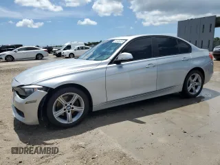 2013 BMW 3 Series 328i with VIN WBA3C1G52DNR49440, listed as a Copart auction lot 61546685 with 118,308 mi miles and Salvage title. Bid and sale history available at DreamBid. Image 1.