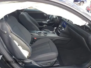 2021 Ford Mustang EcoBoost z VIN 1FA6P8TH2M5140071, wystawiony jako IAAI lot #41775674 z przebiegiem 20 184 mil mil oraz . Historia ofert i sprzedaży dostępna na DreamBid. Obrazek 5.
