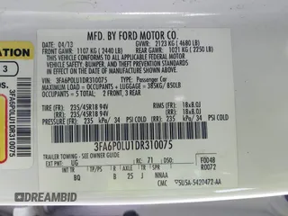 2013 Ford Fusion SE Hybrid z VIN 3FA6P0LU1DR310075, wystawiony jako IAAI lot #42085556 z przebiegiem Nie podano mil oraz . Historia ofert i sprzedaży dostępna na DreamBid. Obrazek 9.