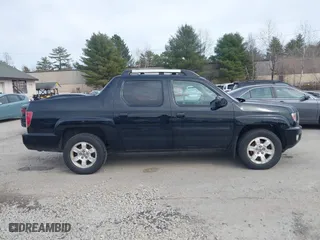 2011 Honda Ridgeline RTS with VIN 5FPYK1F4XBB453373, listed as a IAAI auction lot 41837086 with 268,041 mi miles. Bid and sale history available at carsss.com. Image 13.