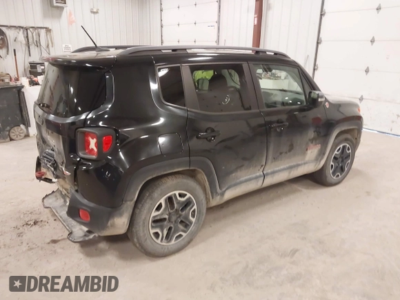 2015 Jeep Renegade Trailhawk with VIN ZACCJBCT7FPB35801, listed as a IAAI auction lot 41991084 with 119,887 mi miles and . Bid and sale history available at DreamBid. Image 4.