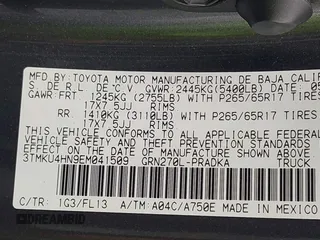 2014 Toyota Tacoma PreRunner with VIN 3TMKU4HN9EM041509, listed as a IAAI auction lot 42441194 with 290,715 mi miles and . Bid and sale history available at DreamBid. Image 9.
