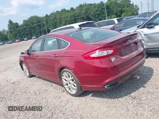 2013 Ford Fusion Titanium with VIN 3FA6P0D98DR333167, listed as a IAAI auction lot 39914722 with 200,851 mi miles. Bid and sale history available at carsss.com. Image 3.