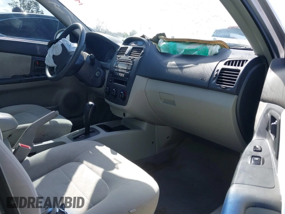 2005 Kia Spectra LX with VIN KNAFE122355139496, listed as a IAAI auction lot 41955660 with 58,676 mi miles. Bid and sale history available at carsss.com. Image 5.