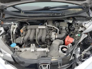 2017 Honda Fit EX-L z VIN JHMGK5H83HS003294, wystawiony jako Copart lot #57203345 z przebiegiem 38 177 mil mil oraz Szkoda całkowita • Salvage title. Historia ofert i sprzedaży dostępna na DreamBid. Obrazek 11.