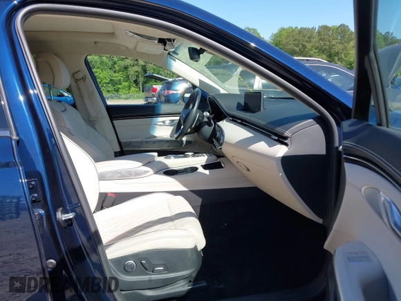 2023 Genesis GV70 Sport with VIN KMUMCDTC1PU083539, listed as a IAAI auction lot 42107968 with 21,169 mi miles and . Bid and sale history available at DreamBid. Image 5.