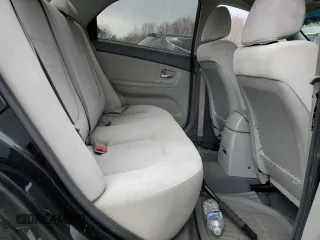 2009 Kia Spectra EX with VIN KNAFE222795620282, listed as a Copart auction lot 53187425 with 0 mi miles and Salvage Title. Bid and sale history available at carsss.com. Image 10.