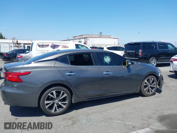 2018 Nissan Maxima Platinum z VIN 1N4AA6AP1JC388815, wystawiony jako IAAI lot #42098902 z przebiegiem 80 677 mil mil oraz . Historia ofert i sprzedaży dostępna na DreamBid. Obrazek 13.