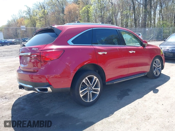 2018 Acura MDX w/Advance/Entertainment Pkg with VIN 5J8YD4H90JL006920, listed as a IAAI auction lot 41957396 with 58,832 mi miles. Bid and sale history available at carsss.com. Image 4.