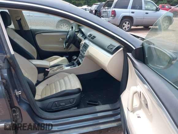 2009 Volkswagen CC Luxury z VIN WVWHL73C09E531918, wystawiony jako IAAI lot #42433505 z przebiegiem 223 692 mil mil oraz . Historia ofert i sprzedaży dostępna na DreamBid. Obrazek 5.