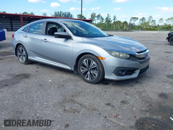 2017 Honda Civic EX-T with VIN 19XFC1F39HE001756, listed as a IAAI auction lot 42030331 with 44,056 mi miles. Bid and sale history available at carsss.com. Image 1.