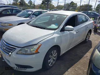 2014 Nissan Sentra S with VIN 3N1AB7APXEL662717, listed as a IAAI auction lot 40998099 with 133,363 mi miles and . Bid and sale history available at DreamBid. Image 2.