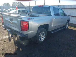 2014 Chevrolet Silverado 1500 LTZ with VIN 3GCUKSEC3EG400650, listed as a IAAI auction lot 41596087 with 127,240 mi miles. Bid and sale history available at carsss.com. Image 4.