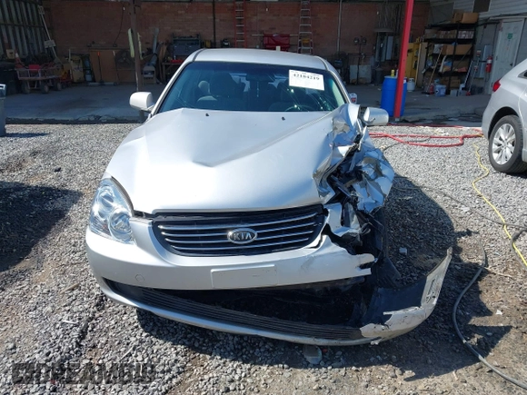 2008 Kia Optima LX z VIN KNAGE123385225909, wystawiony jako IAAI lot #42184219 z przebiegiem 118 300 mil mil oraz . Historia ofert i sprzedaży dostępna na DreamBid. Obrazek 12.