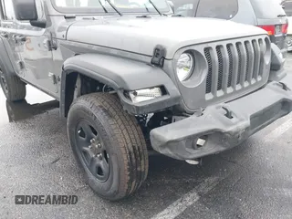 2022 Jeep Wrangler Unlimited High Tide with VIN 1C4HJXDG8NW126143, listed as a IAAI auction lot 41507703 with 44,472 mi miles and . Bid and sale history available at DreamBid. Image 6.