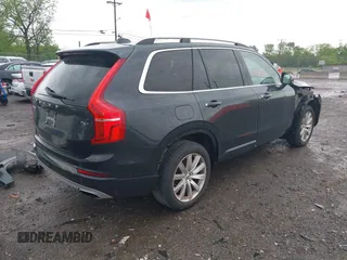 2016 Volvo XC90 T6 Momentum with VIN YV4A22PK7G1074115, listed as a IAAI auction lot 42083321 with 150,135 mi miles. Bid and sale history available at carsss.com. Image 4.