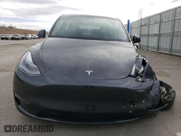 2024 Tesla Model Y Long Range with VIN 7SAYGAEE5RF038446, listed as a Copart auction lot 48868025 with 10,410 mi miles and Salvage Title. Bid and sale history available at DreamBid. Image 5.