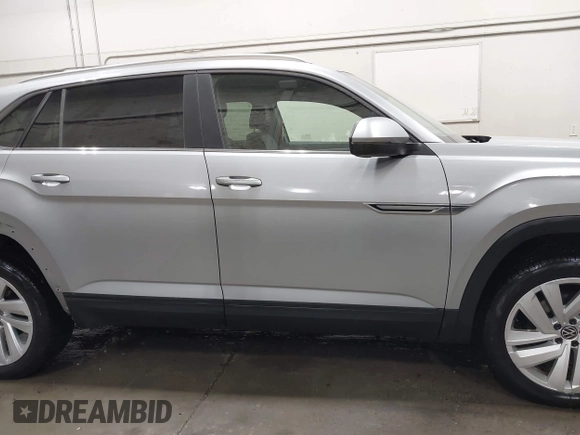 2023 Volkswagen Atlas SE z VIN 1V2KC2CA6PC210593, wystawiony jako IAAI lot #41957633 z przebiegiem 34 801 mil mil oraz . Historia ofert i sprzedaży dostępna na DreamBid. Obrazek 14.