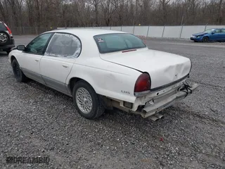 1997 Chrysler LHS with VIN 2C3HC56FXVH592484, listed as a IAAI auction lot 41667403 with 139,051 mi miles. Bid and sale history available at carsss.com. Image 3.