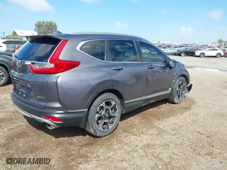 2019 Honda CR-V Touring with VIN 7FARW1H99KE005270, listed as a IAAI auction lot 41762812 with 122,583 mi miles. Bid and sale history available at carsss.com. Image 4.